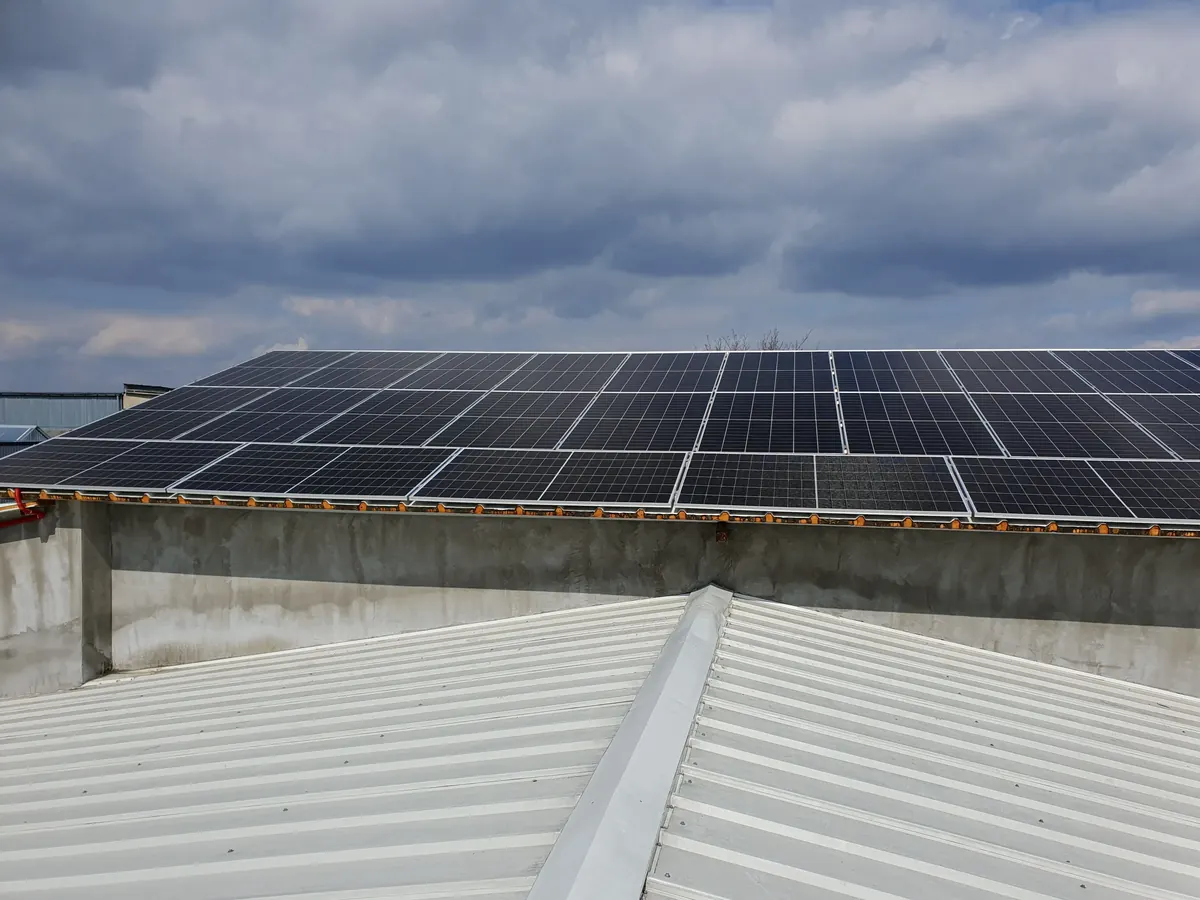 Photovoltaic panels on the roof of the Moga Knitworks factory