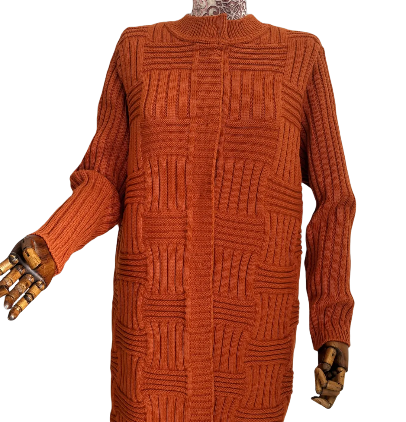 Rust textured knitted garment detail