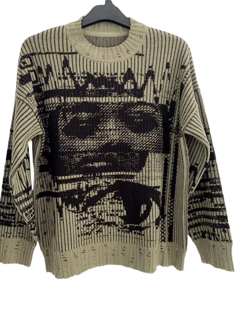 Sweater with knitted jacquard motif
